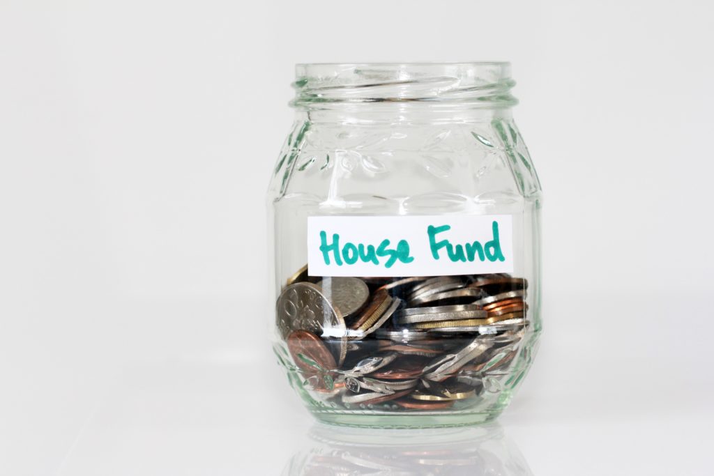 bottle with house fund on it - frugal living tips for moms in 2020