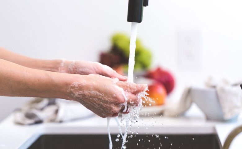 woman washing hands- boost your immune system
